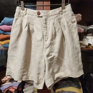 100 % linen shorts with elastic waist in the back. Size 26